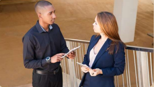 Two people discussing home selling options in killeen tx